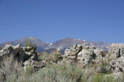 Tufa backed by snow-dotted mountains at Mono Lake. 