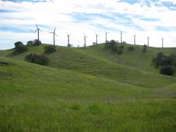 Windmills on a hill along the skyline in Pacheco State Park, California.