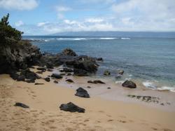 Black rocks on Kapalua Beach on Maui. 