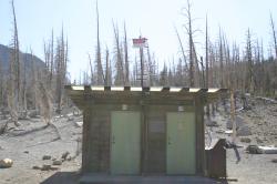 Sign above a restroom: "DANGER. Natural toxic gas. Hazardous area. Keep out." I found this too funny to pass up. However, the reasons for the sign are not so funny.

Natural CO2 outgassing from a magma body beneath Mammoth Mountain asphyxiated more than 100 acres of trees near Horseshoe Lake in the early 1990s. The gasses become concentrated to deadly levels in enclosed structures such as cabins and restrooms (and tents -- camping was prohibited here). 